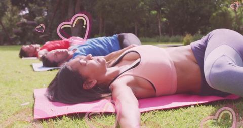 Group Practicing Outdoor Yoga with Tranquility