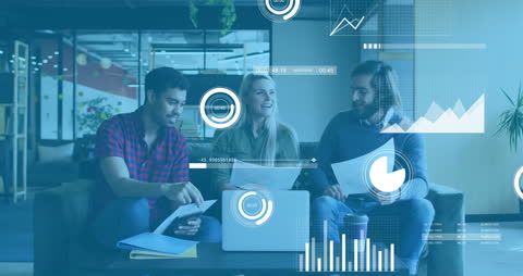 Diverse Team Engaging with Digital Data Analytics in Modern Office