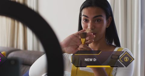 Social media influence with vlogger applying makeup