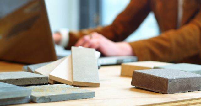 Architect Working on Design Project with Building Material Samples - Download Free Stock Images Pikwizard.com