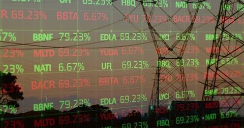 Silhouette of Power Lines with Streaming Market Data Display