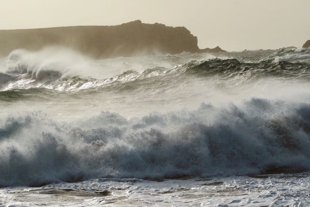 Stormy Sea Waves Crashing on Rocky Shoreline at Sunset - Download Free Stock Photos Pikwizard.com