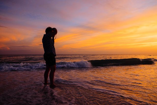 Father Holding Child at Sunset on Beach - Download Free Stock Photos Pikwizard.com