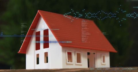 Miniature Architectural Model House with Futuristic Digital Elements