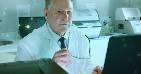 Scientist Analyzing Data on Computer in Modern Laboratory Setting - Download Free Stock Images Pikwizard.com