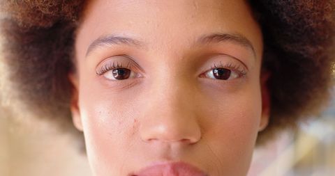 Close-Up of Young Businesswoman in Office Environment