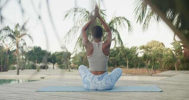 Woman Practicing Yoga Outdoors By Pool Amidst Nature - Download Free Stock Images Pikwizard.com