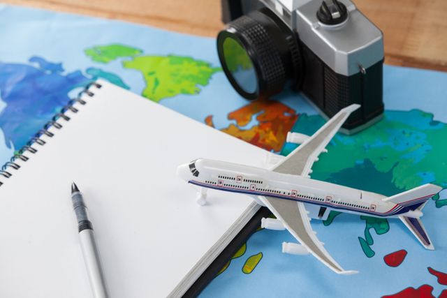 Ideal for travel blogs, vacation planning websites, and tourism advertisements. Perfect for illustrating travel preparation, adventure planning, and holiday concepts. Can be used in articles about travel tips, destination guides, and travel gear reviews.