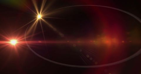 Abstract Lens Flare Lights Against Dark Backdrop - Download Free Stock Images Pikwizard.com
