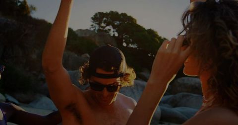 Friends Enjoying Summer Adventure at Rocky Beach Cove