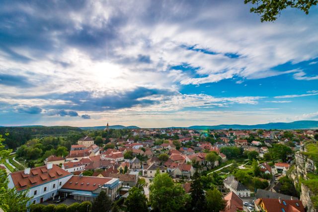 Scenic Aerial View of Charming Town with Red Roofs and Countryside - Download Free Stock Images Pikwizard.com