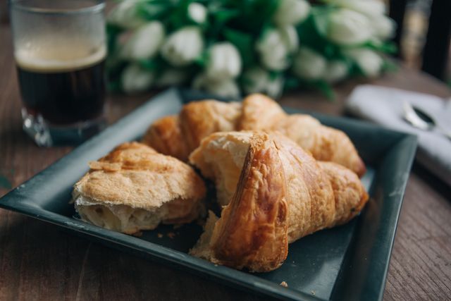 Freshly Baked Croissants with Coffee on Wooden Table - Download Free Stock Photos Pikwizard.com