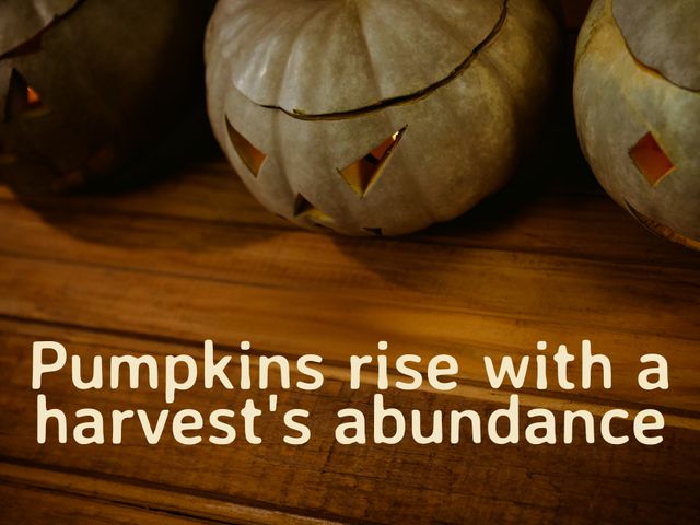 Carved Pumpkins Evoking Festive Halloween Spirit on Wooden Table - Download Free Stock Videos Pikwizard.com
