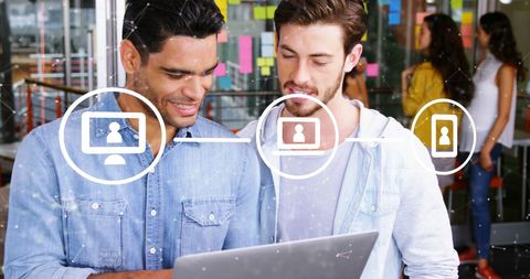 Diverse Coworkers Engaging in Teamwork and Digital Collaboration