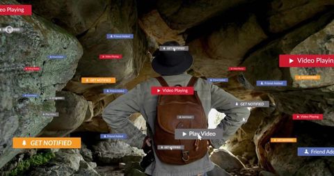 Adventurous hiker explores cave as digital notifications pop up
