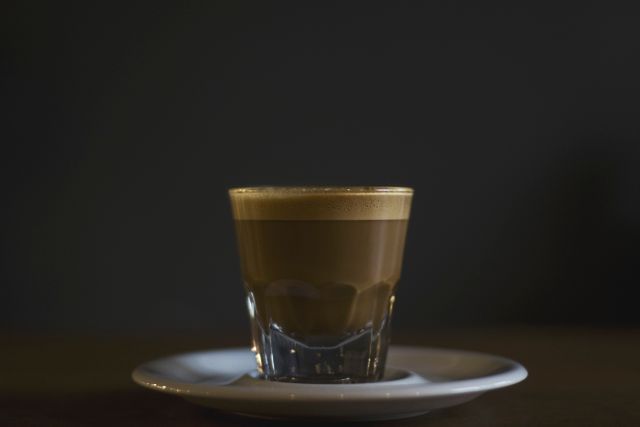 Freshly Brewed Cortado Coffee in Glass Cup on Dark Background - Download Free Stock Photos Pikwizard.com