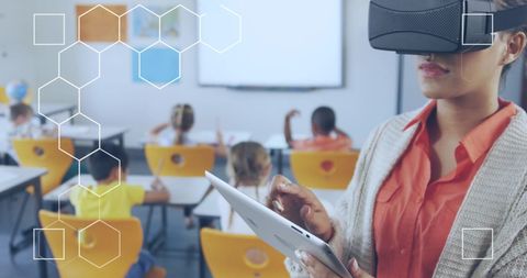 Female teacher using vr technology in modern classroom