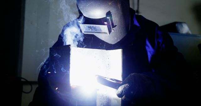 Industrial Welder in Protective Gear Working with Metal - Download Free Stock Images Pikwizard.com