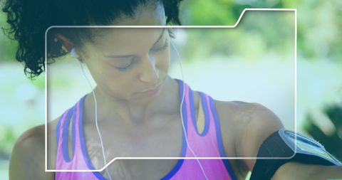 Athlete Wearing Earphones with Digital Interface