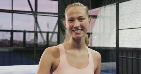 Smiling Athlete on Padel Court Ready for Match
