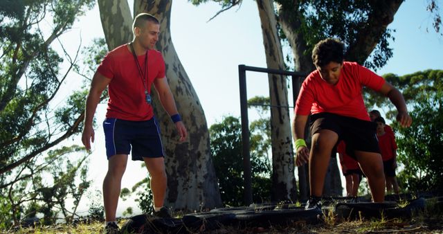 Teen Boys Training Outdoors with Coach on Sunny Day - Download Free Stock Images Pikwizard.com