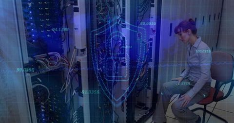 Female technician inspecting server rack with cybersecurity overlay and monitoring UI