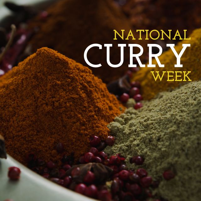 Image of curry week over stack of diverse spices. Indian cuisine, food, meal, curry and spices concept.