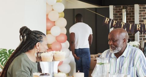 Joyful Retirement Celebration with Family Sharing Wisdom