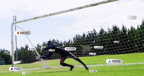 Soccer Goalkeeper Engages with Digital Interactions on Field
