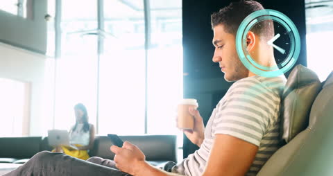 Young Professional Multitasking in Modern Work Environment