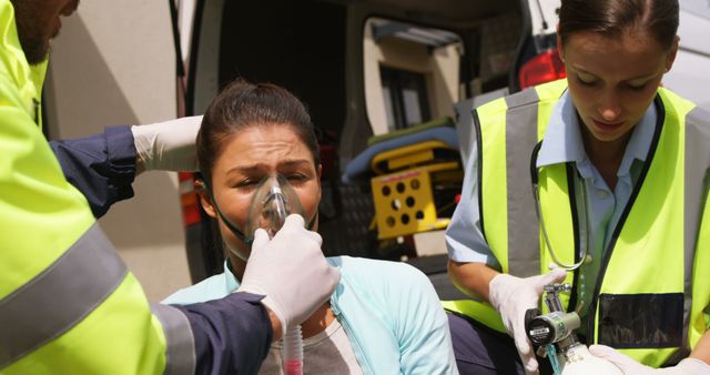 Emergency Medical Technicians Assisting Woman with Oxygen Mask - Download Free Stock Images Pikwizard.com