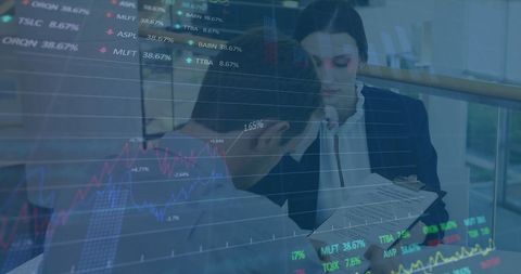 Financial Analysts Discussing Digital Stock Market Data