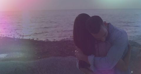 Romantic Beach Hug at Sunset with Soft Light Effects - Download Free Stock Images Pikwizard.com