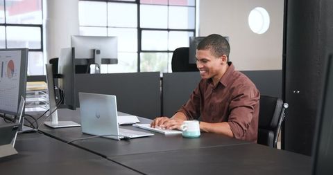 Businessman Working Online in Modern Office Environment