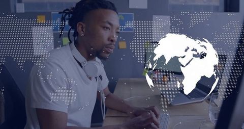 Man Working at Desk with Global Connectivity Concept Overlay