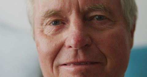 Close Up Portrait of Senior Man Smiling During Pandemic