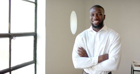 Confident business professional with positive attitude in office