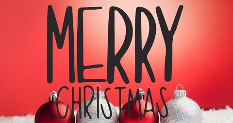 Festive Merry Christmas Text Over Red Baubles