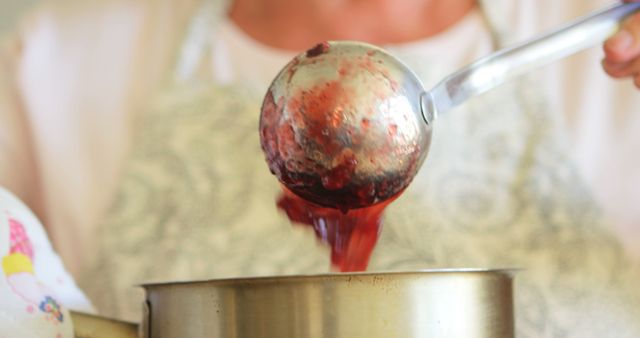 Senior Woman Cooking Delicious Fruit Jam in Cozy Kitchen - Download Free Stock Images Pikwizard.com