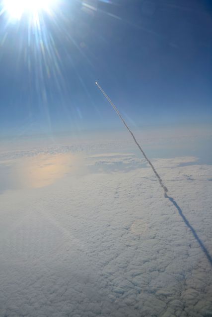 STS134-S-063 (16 May 2011) --- Photographed from a shuttle training aircraft, space shuttle Endeavour and its six-member STS-134 crew head toward Earth orbit and rendezvous with the International Space Station. Liftoff was at 8:56 a.m. (EDT) on May 16, 2011, from Launch Pad 39A at NASA's Kennedy Space Center. Onboard are NASA astronauts Mark Kelly, commander; Greg H. Johnson, pilot; Michael Fincke, Andrew Feustel, Greg Chamitoff and European Space Agency astronaut Roberto Vittori, all mission specialists. STS-134 will deliver the Alpha Magnetic Spectrometer-2 (AMS), Express Logistics Carrier-3, a high-pressure gas tank and additional spare parts for the Dextre robotic helper to the International Space Station. STS-134 is the final spaceflight for Endeavour. Photo credit: NASA