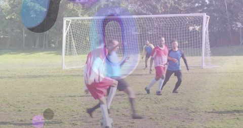 Community soccer players competing near goal with colorful overlay and dynamic motion blur