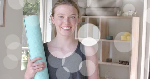 Teen Girl Joyfully Holding Yoga Mat, Embracing Fitness