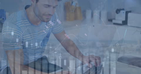 Businessman Analyzing Data with Laptop and Graph Overlays