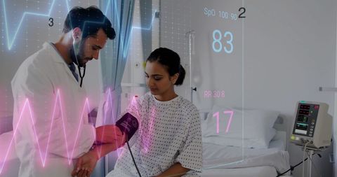 Doctor monitoring patient with digital cardiograph interface