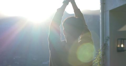 Morning Stretch Overlooking Mountain Sunrise