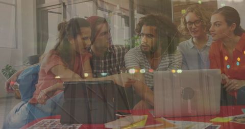 Diverse Team Collaborating with Technology for Financial Analysis