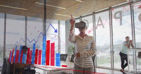 Businesswoman using vr headset interacting with ar data visualization in panoramic office