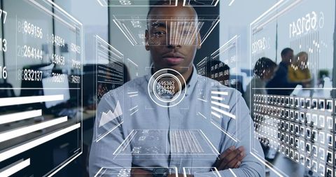 Futuristic data analyst standing with arms crossed surrounded by holographic dashboards