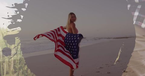 Happy Woman Draped in American Flag on Scenic Beach