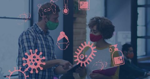 Colleagues Discuss Safety Measures with COVID-19 Icons Overlay